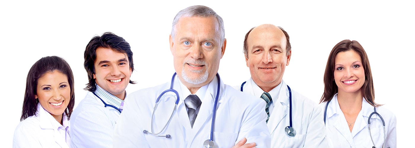 Five physicians in white coats with stethoscopes, standing together against a white background.