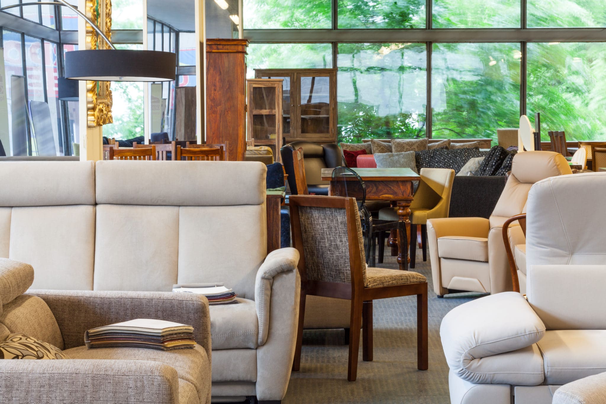 A showroom of sofas, armchairs and dining furniture