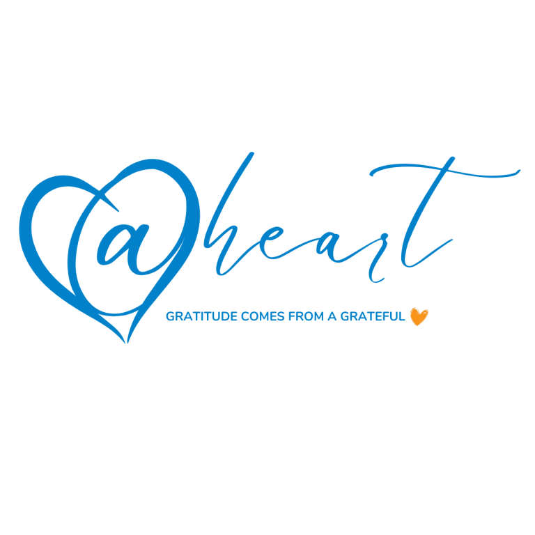 The @Heart logo: the word @heart in blue script inside an outlined heart, above the line Gratitude comes from a grateful heart