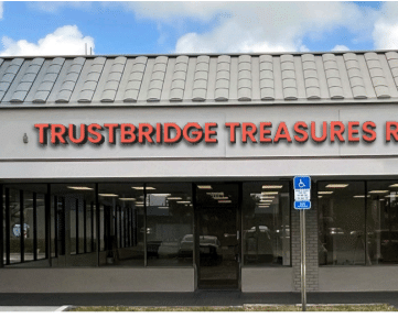 The Fort Lauderdale shop, with Trustbridge Treasures Resale Shop in red lettering above the windows